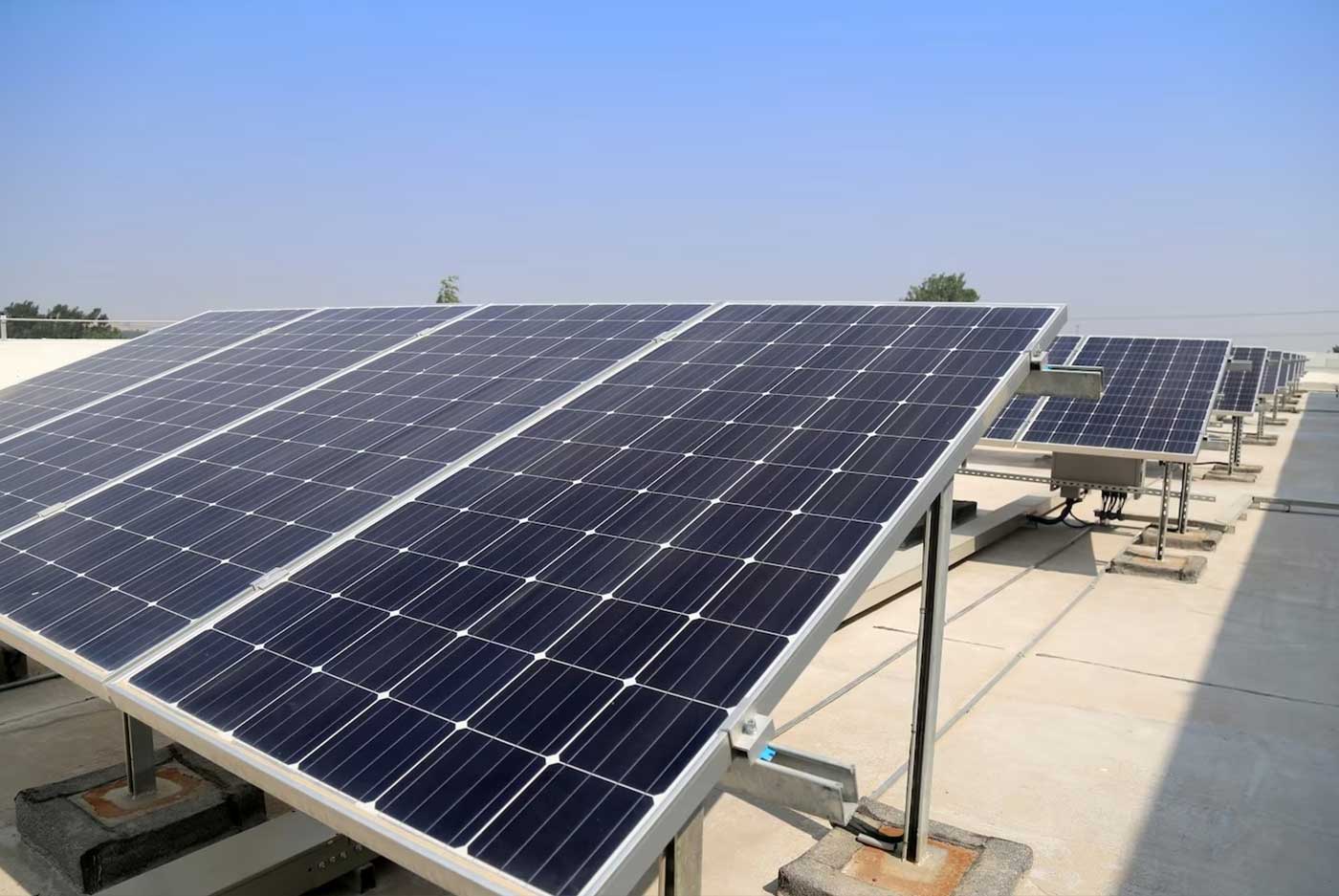 Solar panels from GoSolar installed at an angle on a flat roof