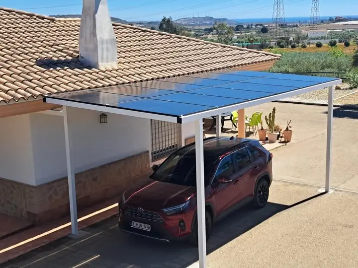 Pergola used as a solar car port