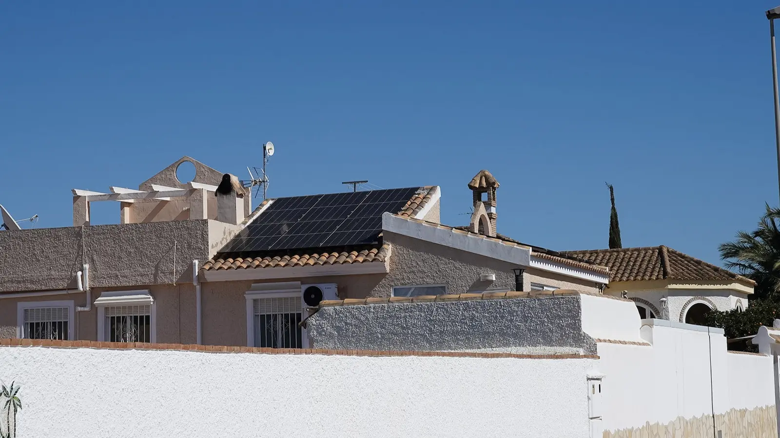 Solar panels on a sloped tiled roof - by Go Solar in southern Spain